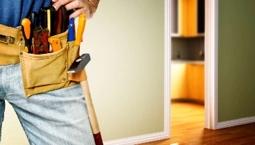 A person with a tool belt.