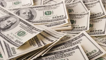 Photo of a pile of $100 bills