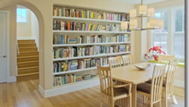 Bookshelf in dining room.