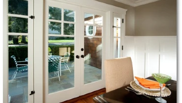 Dining room with French doors.
