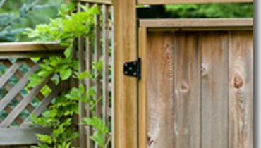 Wooden gate with hinges