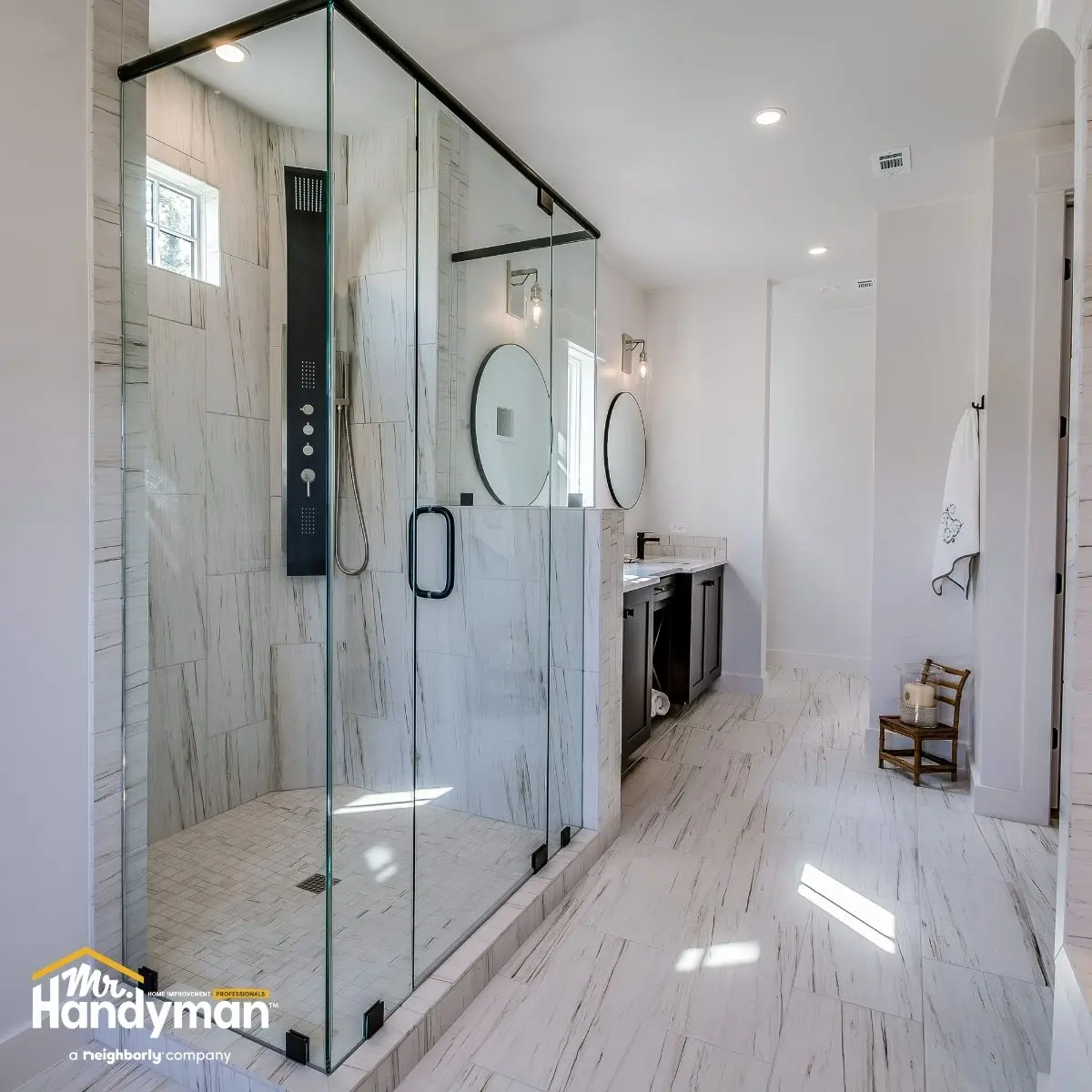 Glass shower with white ceiling.