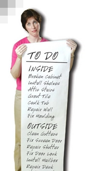 A woman holding a sign that says to do inside.