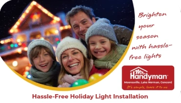Smiling family in winter hats with holiday lights behind.