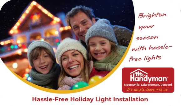 Smiling family in winter hats with holiday lights behind.