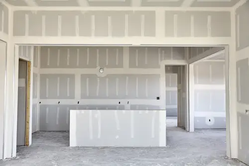 New construction rooms with taped drywall seams