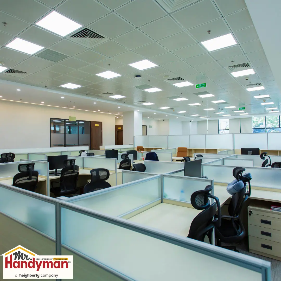 Office interior with white ceiling lights.