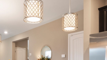 Pendant lighting upgrade in modern Northern Indiana kitchen during year-end renovation.