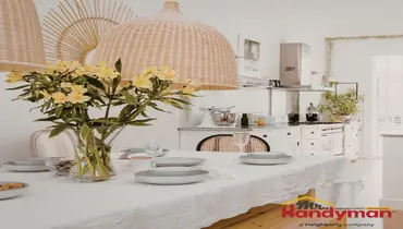 Mr. Handyman technician installing updated cabinet hardware and crown molding in a Plano, Texas home