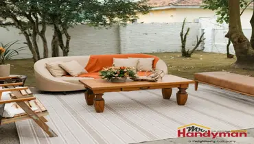 Mr. Handyman technician repairing a screen door and adjusting back door hardware at a Plano, Texas home before summer entertaining season