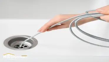 handyman repairing outdoor faucet and plumbing fixtures in Oklahoma City OK home before summer